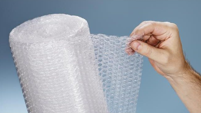 بسته بندی ماشین لباسشویی با پلاستیک حباب دار